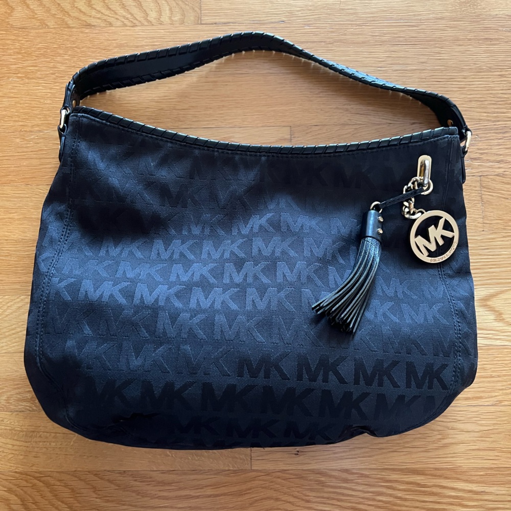 Michael Kors black hobo with tassel and gold MK